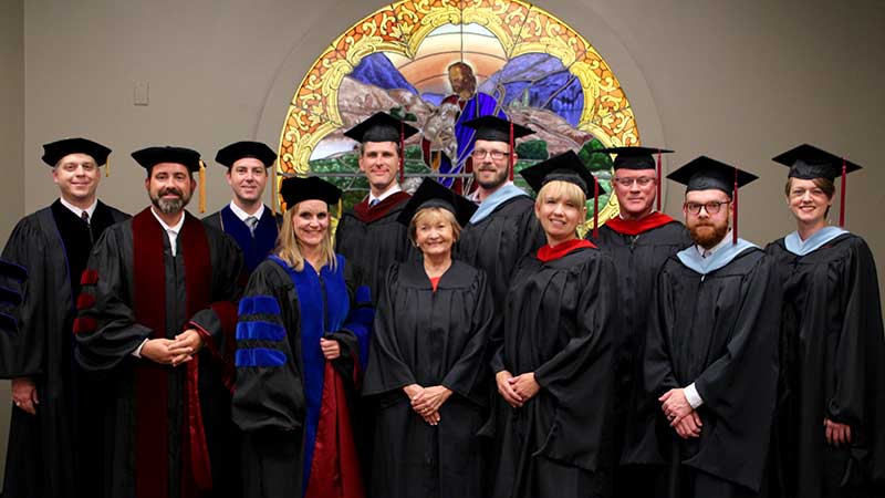 Carroll Institute Graduates 22 Students